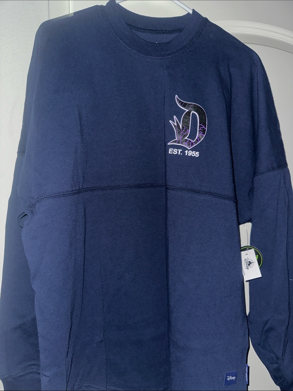 Disney Crewneck Sweatshirt with Purple Accent D Logo.